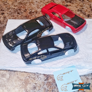 Decals, decals, decals. Charger driver side still to go. Oh, and another Hellcat relative showed up to say ‘HI’.